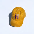 H cap